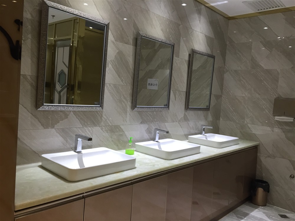 KTV洗手间墙、地面选取J9集团直营瓷砖全抛釉爱丁堡-天堡石KYP8062铺贴